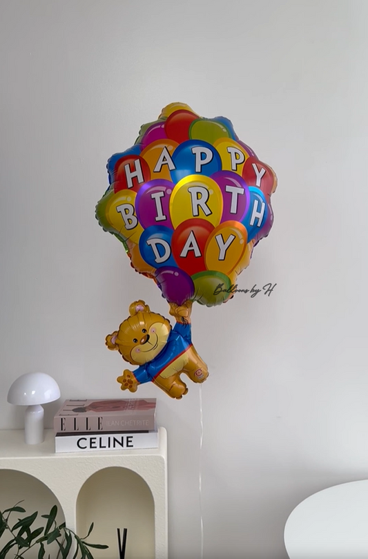 Teddy Bear Holding Balloons